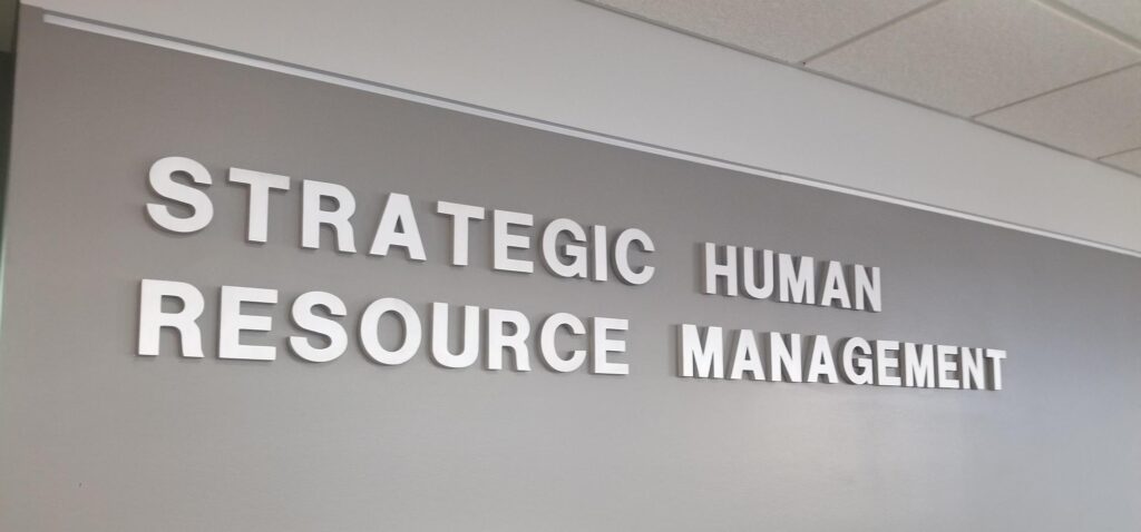 "Strategic Human Resource Management" on the wall outside the SHR Center
