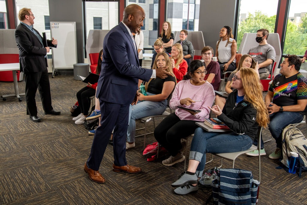 Career Engagement Studio staff and BBA students pictured in a marketing photo shoot