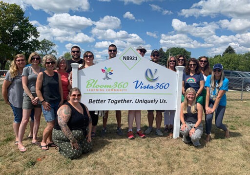 Group of people with sign