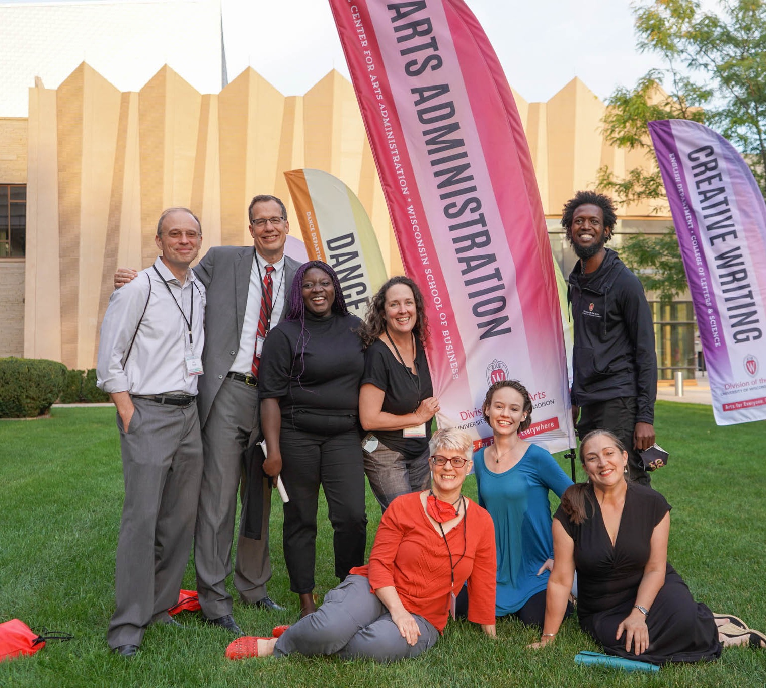 Bolz center members pose on the lawn in front of 