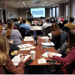 HR Summit participants listening to Jordana Kammerud