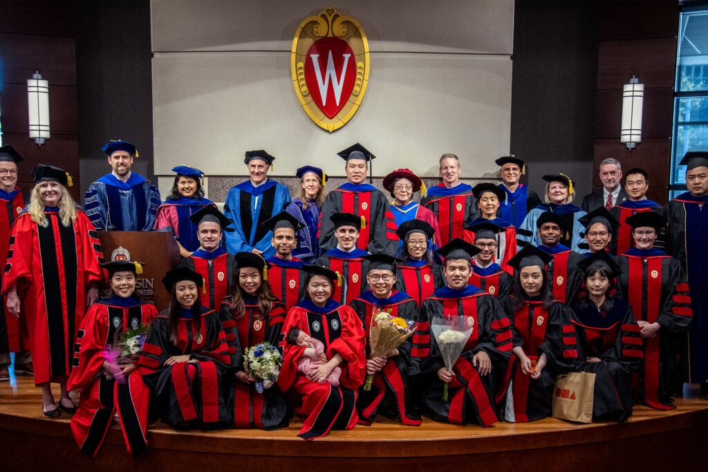 WSB doctoral candidates celebrate their hooding ceremony