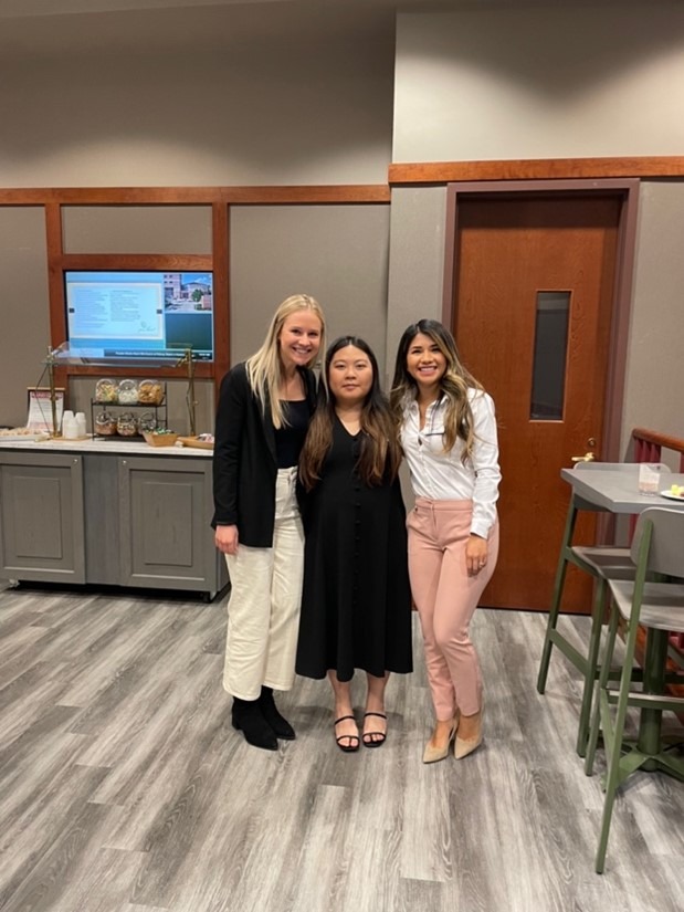 Three students at the meeting