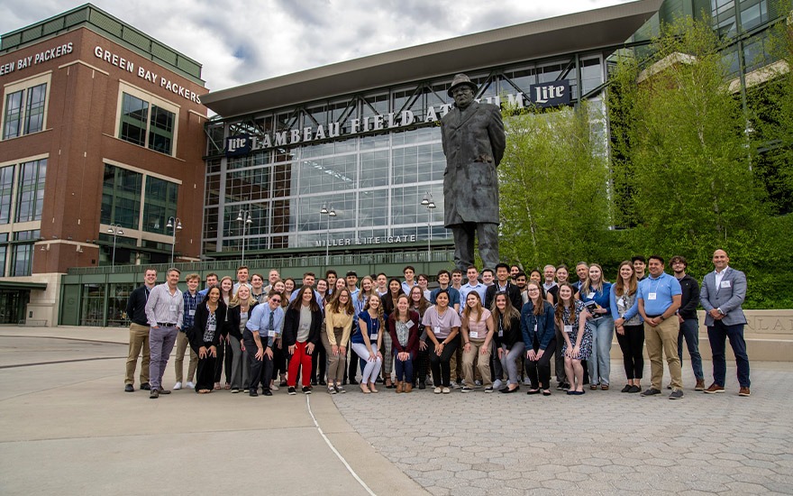 Leadership at Lambeau participants pose outside in front of Lambeau Field