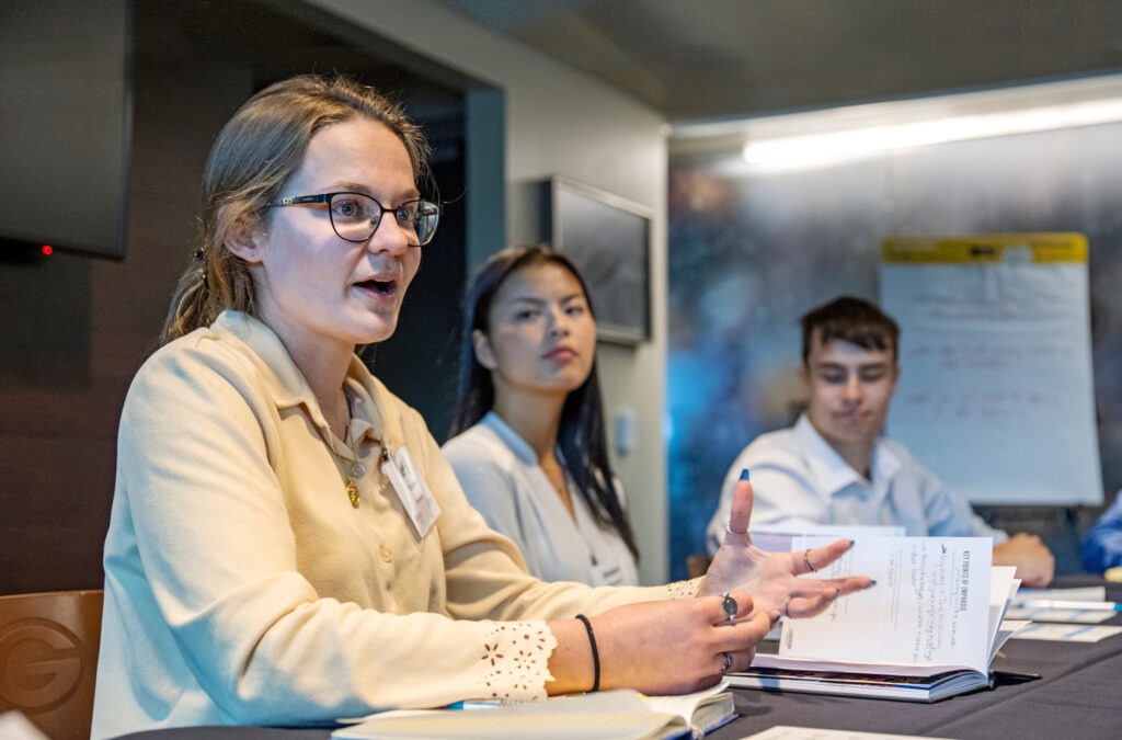 Students talking at table