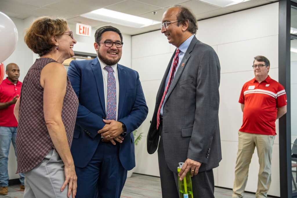 Arturo "Tito" Diaz speaks with Dean Sambamurthy at the Multicultural Center grand opening.