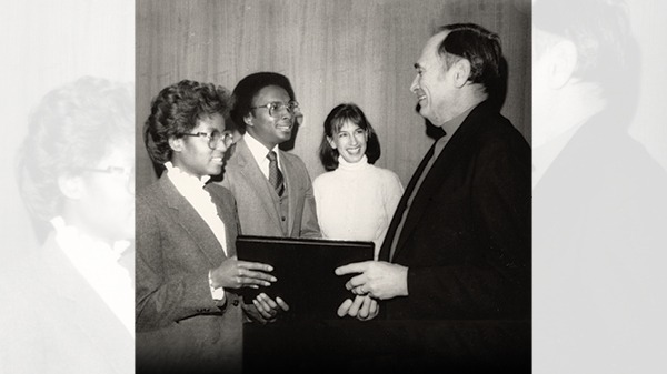 Professor Isadore Fine and three students