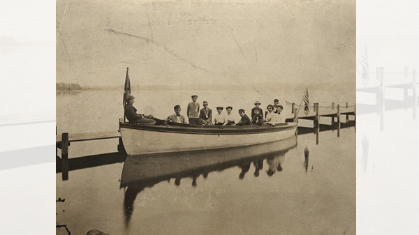 Students in a boat on Lake Mendota