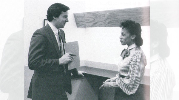 A student and alumnus talking during a mock interview