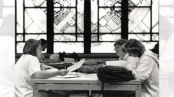 Students studying in the Business Library