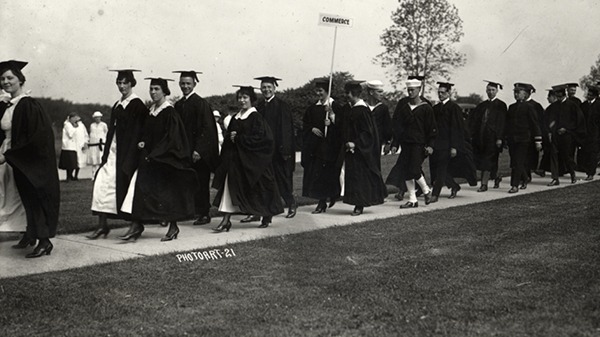 Business students graduating with graduation uniforms on