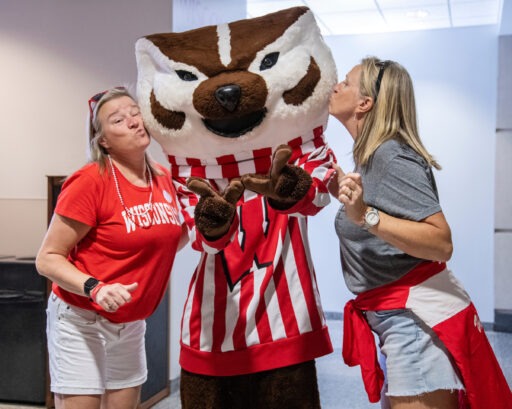 Alums give Bucky Badger a kiss on the cheek