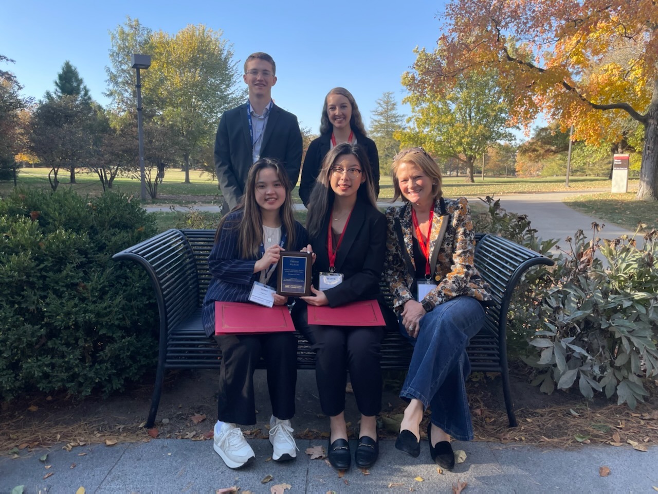 Students at the University of Iowa/NASPO case competition and faculty advisor Verda Blythe