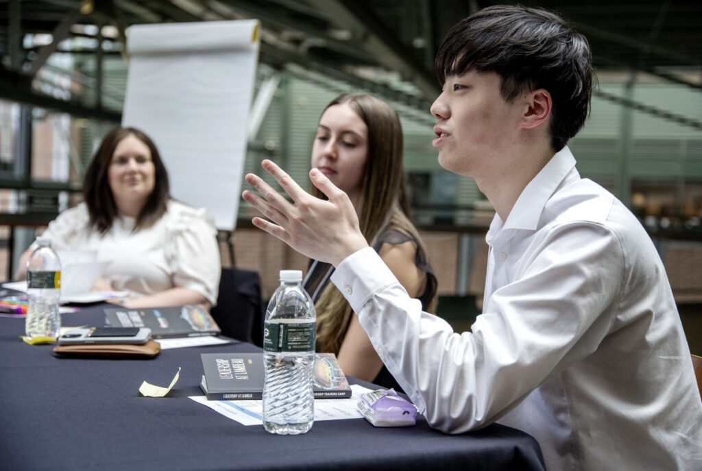 Student speaking as other students listen