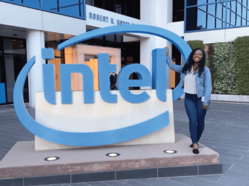 Joseline standing in front of intel logo