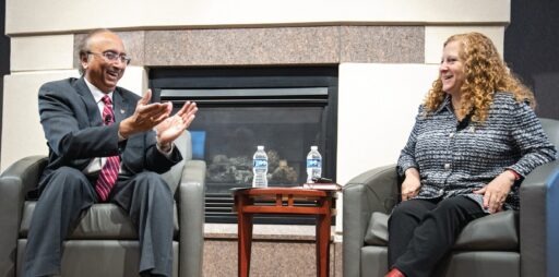 Dean Samba at a fireside chat with chancellor Mnookin