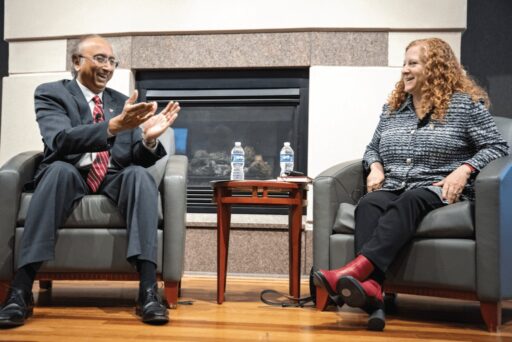 Dean Samba and Chancellor Mnookin laughing during their fireside chat