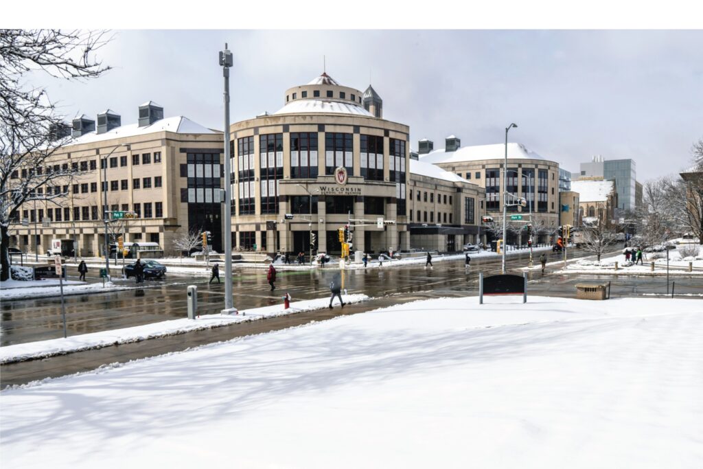 Grainger Hall surrounded by snow