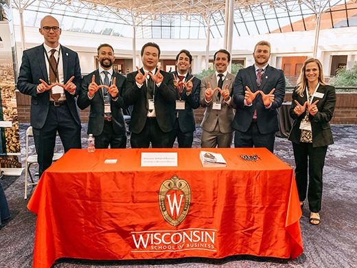 James posing next to fellow MBA Vets Club members