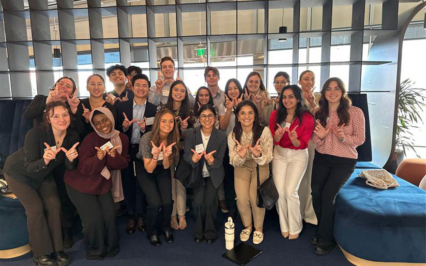 WSB undergrads pose for a photo at Expedia headquarters in Austin, Texas.