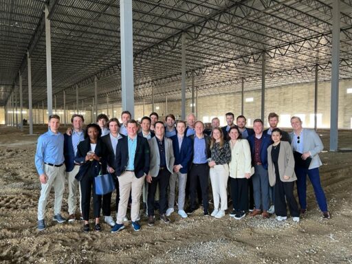 Real Estate Private Equity Students inside an industrial building under construction