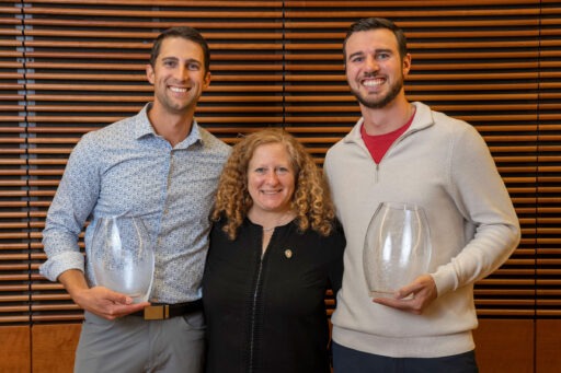 Wes Schroll and Tyler Kennedy appear with Chancellor Jennifer Mnookin