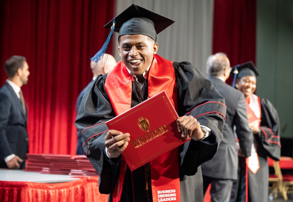 023 BEL graduate Anthony Pittman III celebrates as they walk across the stage during the Spring 2023 Undergraduate Graduation Celebration on Friday afternoon, May 12, 2023, at the Alliant Energy Center -Expo Center.    (Paul L. Newby, II /UW-Madison Wisconsin School of Business)