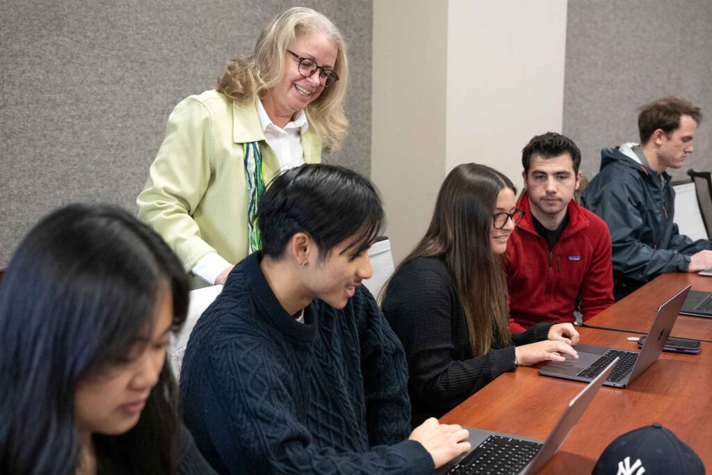 Ann O'Brien's Foundation in Accounting Analytics students work on a project during class.