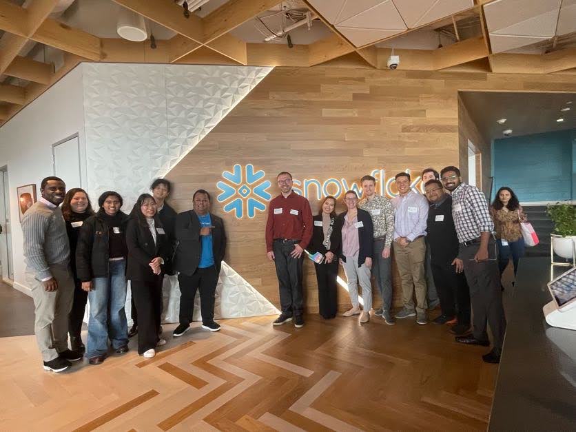 The group poses for a photo at Snowflake