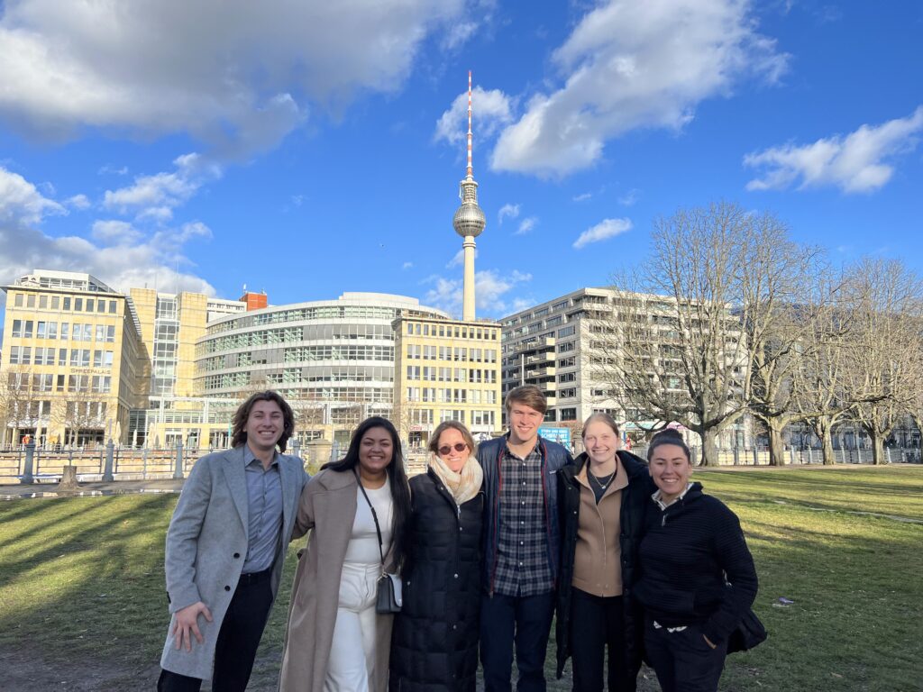The group in front of the Alexanderplatz skyline