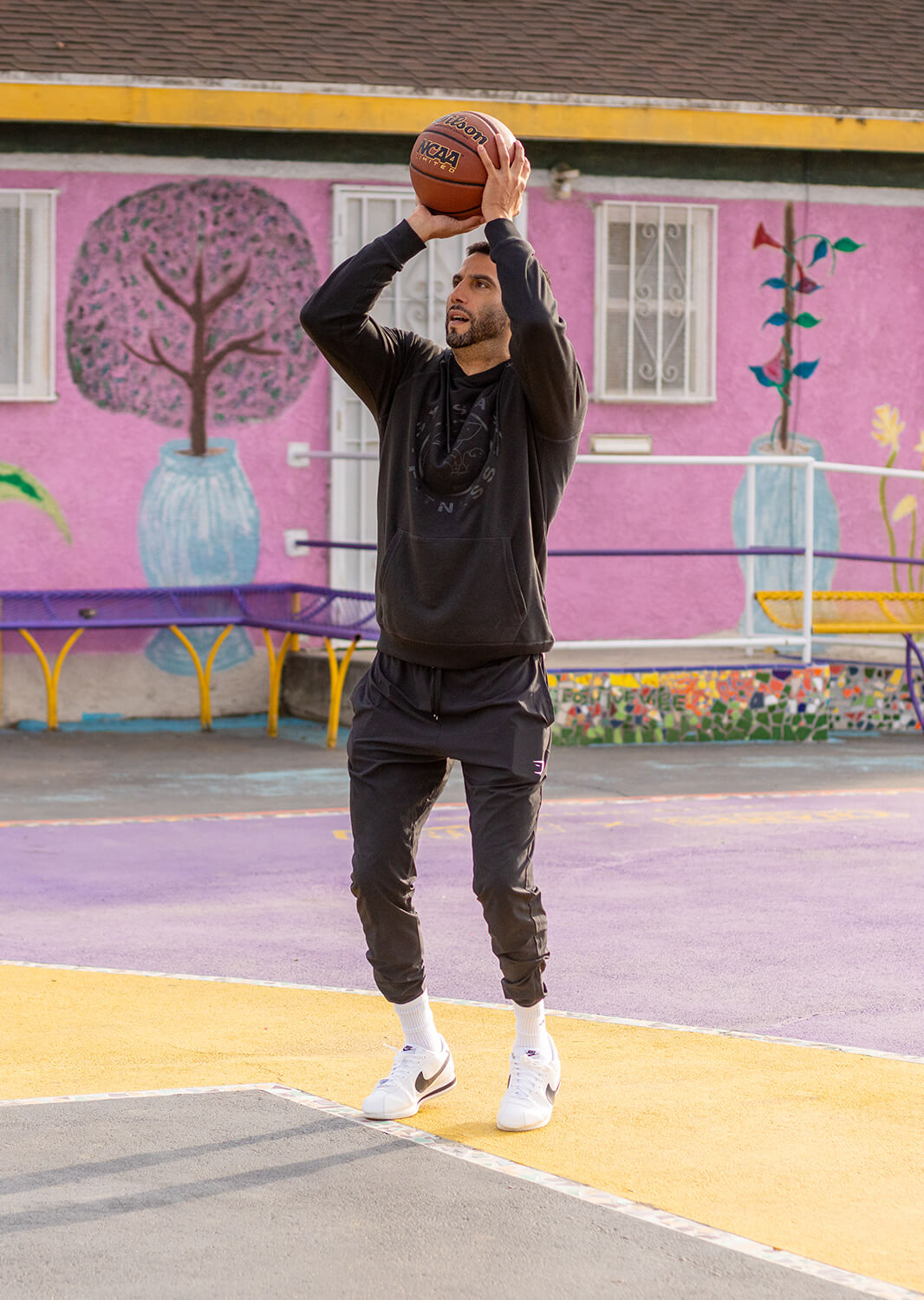 Sennai aiming a basketball before a freethrow