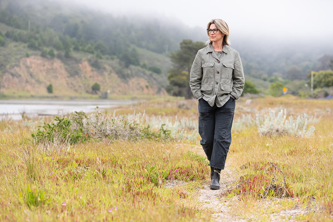 Danielle walking on a prairie trail