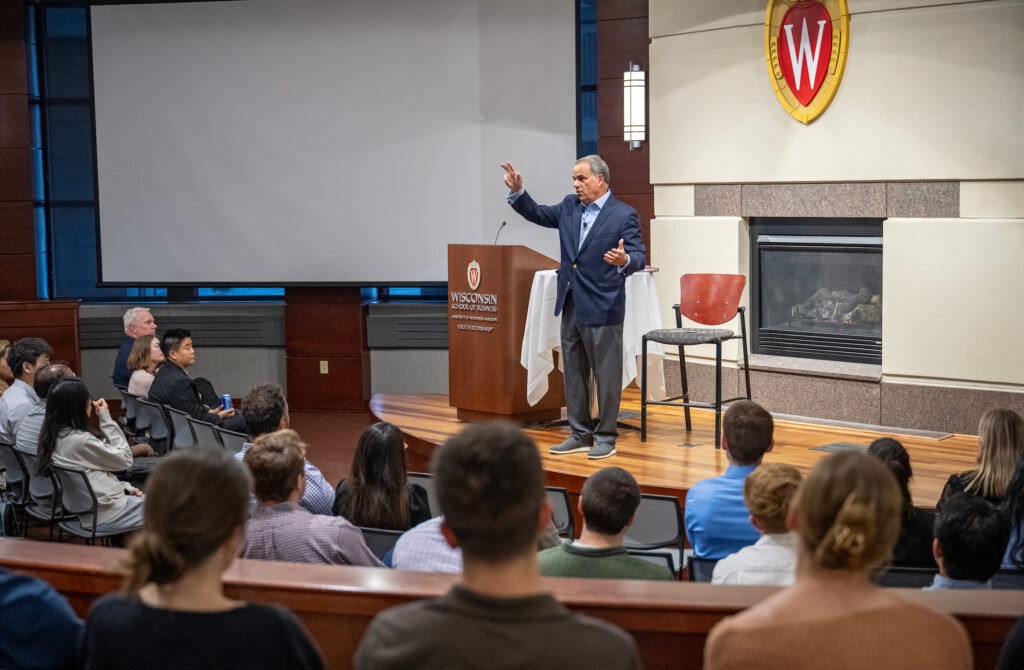 Bob Trunzo addresses an audience of students, alumni, faculty, and staff at a WSB Weikel event.