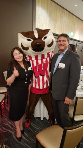 Tim Carr, Real Estate Program Director, and Celina Ko, Global Real Estate Master’s (GREM) student with Bucky