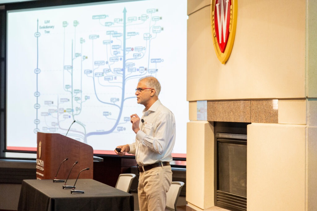 Professor Neeraj Arora presents during an AI applied learning event at Grainger