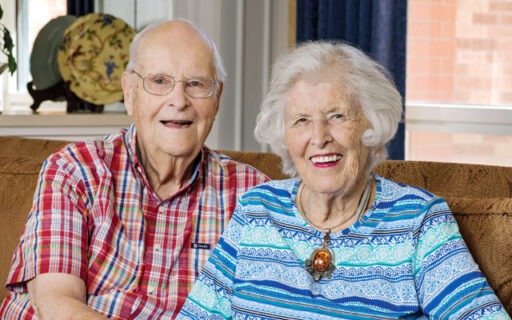 Jack and Marion Bolz sitting together on couch