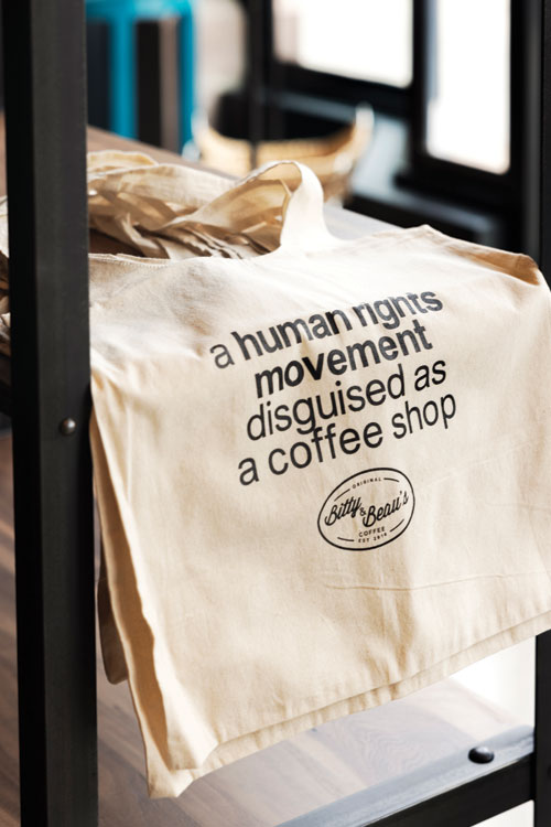 tote bag with text that says: a human rights movement disguised as a coffee shop