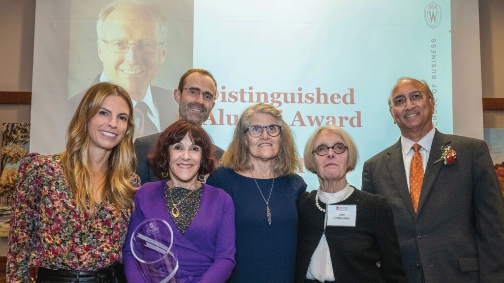 Fred Petri's family stand with WSB deans for his Distinguished Alumni Award
