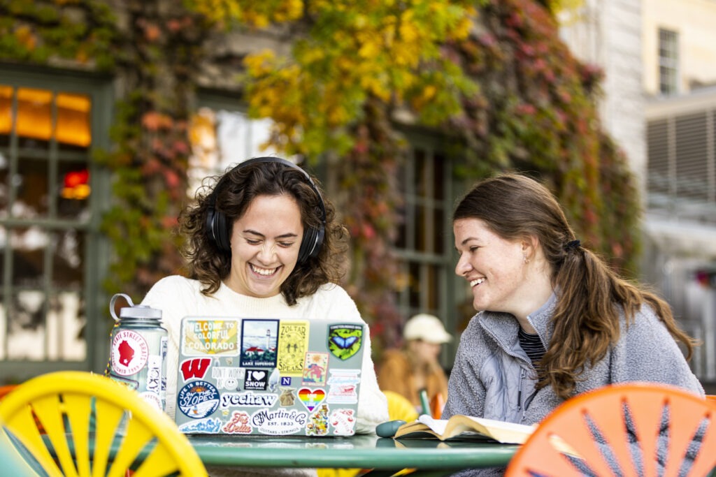 Students study at the Memorial Union Terrace at the University of Wisconsin–Madison during a mild autumn day in Oct. 2023. 