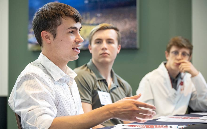 Student leader Nick Kempf shares during a collaborative Leadership at Lambeau summit