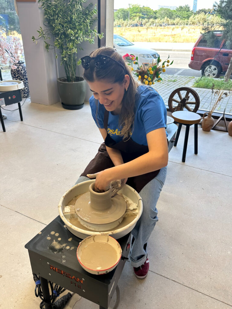Shabnam making pottery