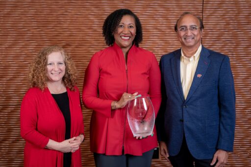 Dorri McWhorter poses with her award alongside Jennifer Mnookin, chancellor of UW–Madison, and Vallabh Sambamurthy, dean of WSB. Photo by Andy Manis