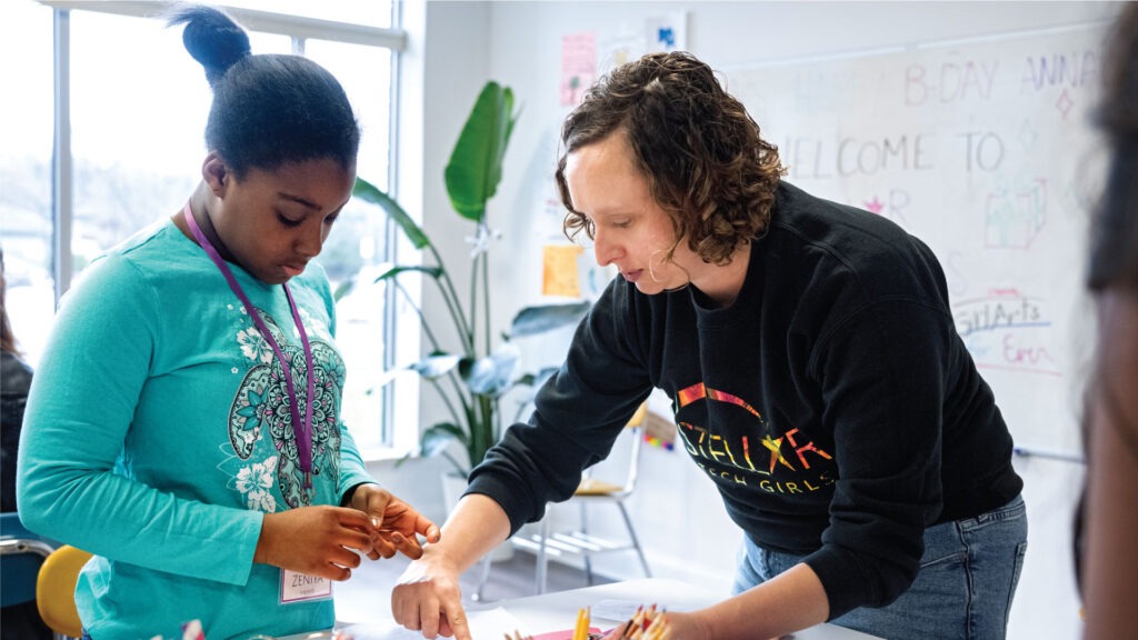 Marina working with a girl at Stellar Tech Girls