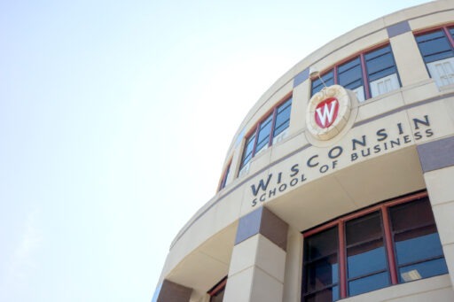 Grainger Hall exterior with sign saying "Wisconsin School of Business"