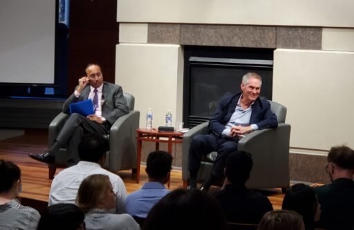 Dean Samba and Richard Lane are seated at a fireside chat on the stage in the Plenary Room at Grainger Hall on September 6, 2024.