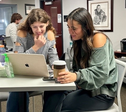 Monika Multhauf tutoring an undergraduate student