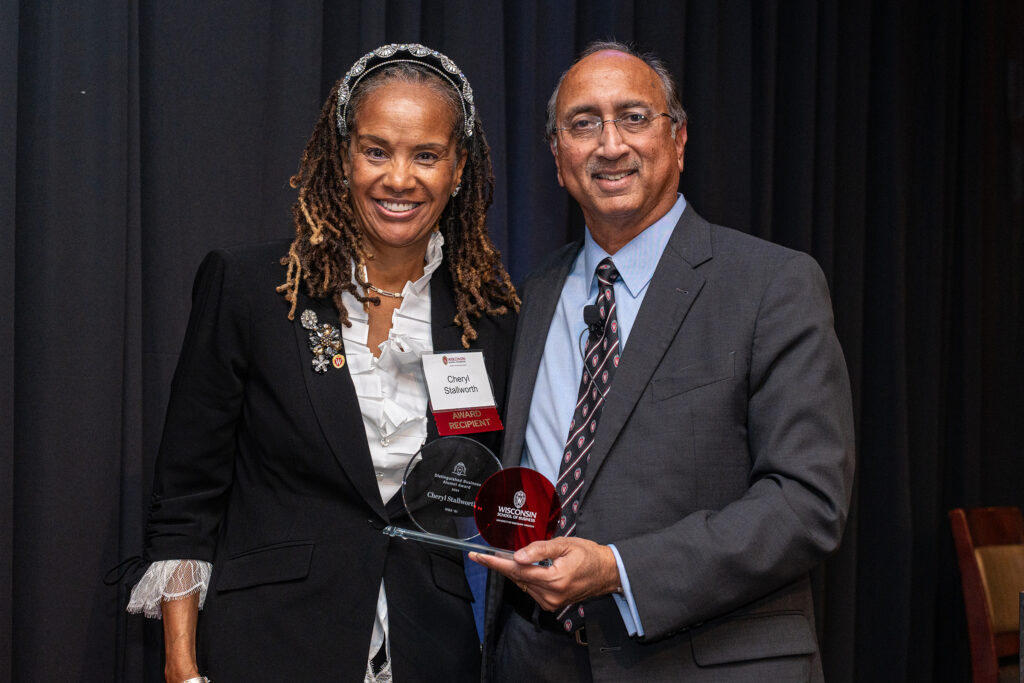 Dean Samba honors Cheryl Stallworth, co-founder of ShedLight, with the Distinguished Business Alumni Award.