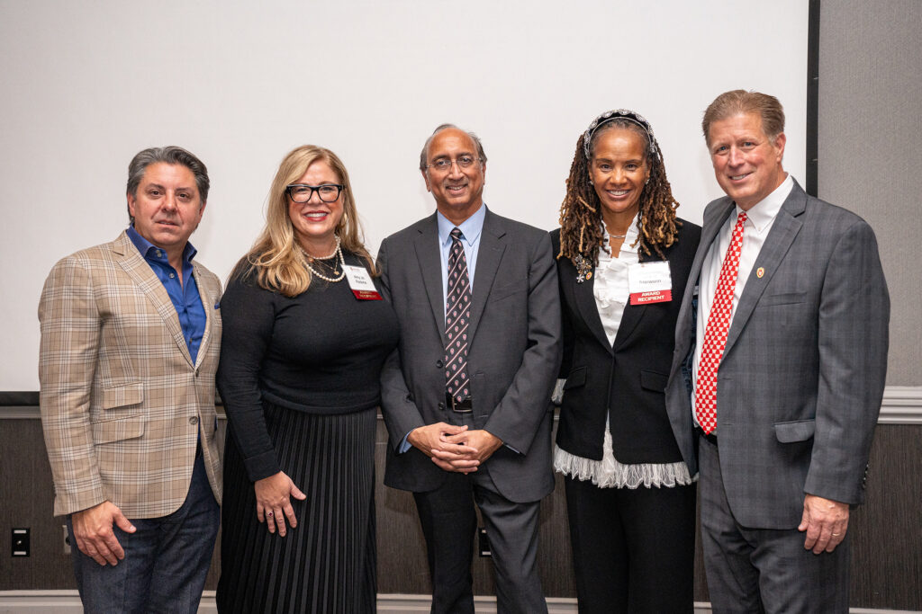 Dean Samba stands alongside the evening’s guests of honor: Colin Welch, Amy Jo Pedone, Cheryl Stallworth, and Dan Kelly.