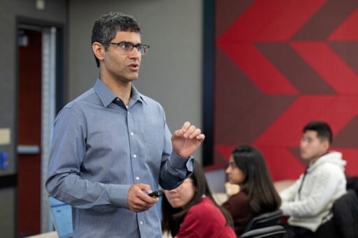 Ishan Anand teaches in the classroom