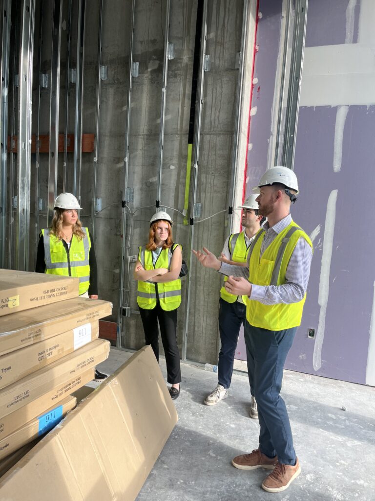 Students on a hard hat development tour